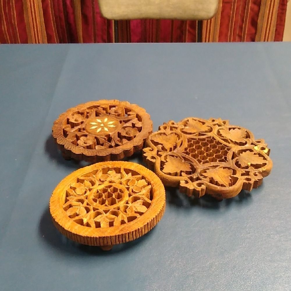 Set of Three Carved Wooden Trivets